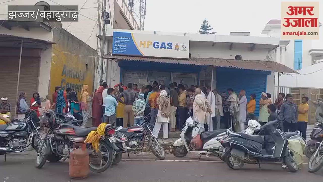 Queues continued at the agency in Jhajjar on Sunday as well; the shutters were pulled down following an uproar