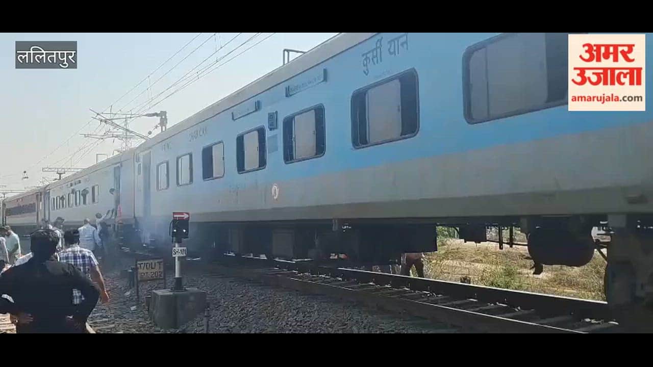 Smoke billowed from the wheels of the Mahamana Express, panicked passengers rushed out of the coach as soon as the train stopped.