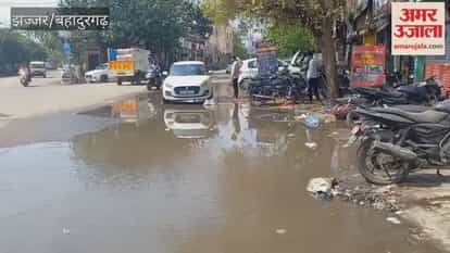 Water accumulated outside shops at Chikkara Chowk