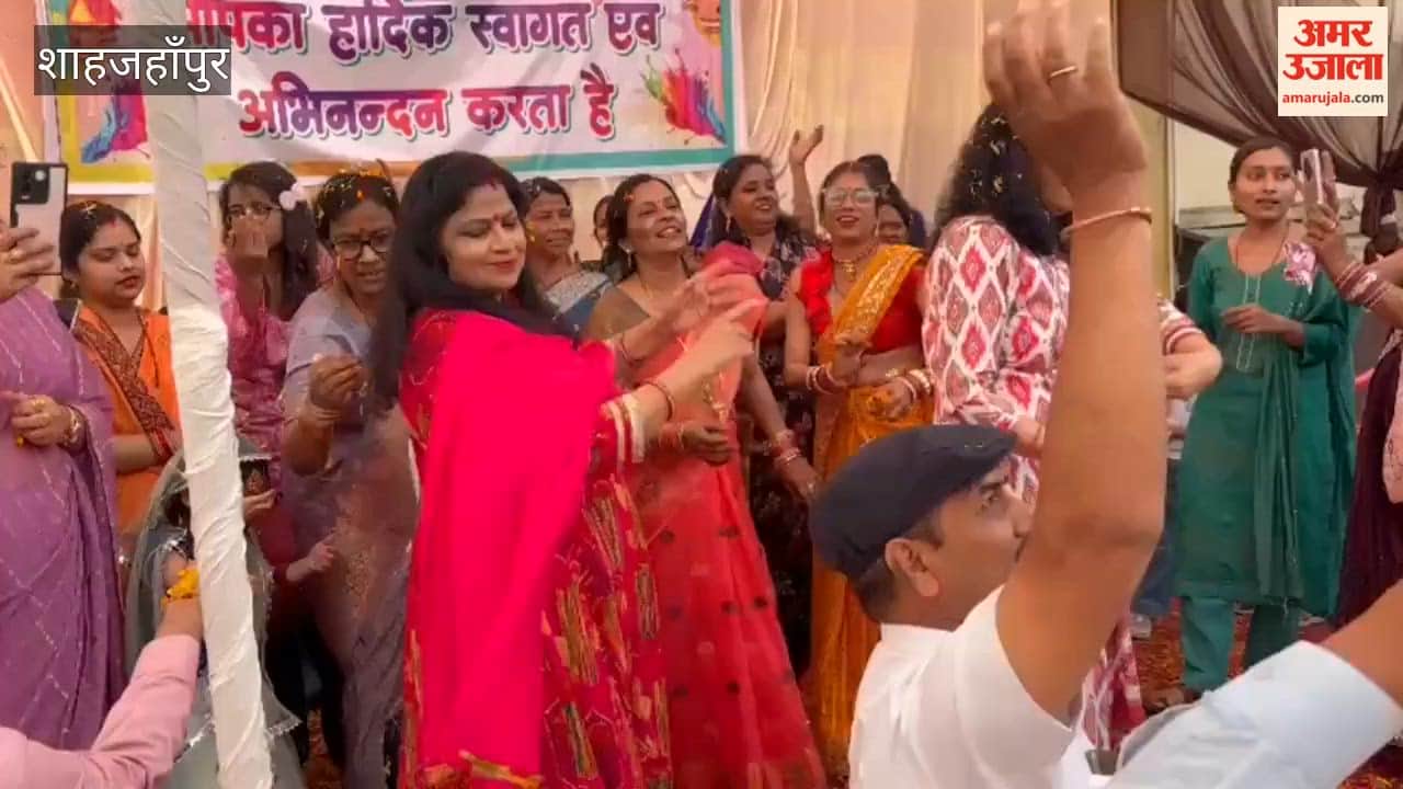 Members of the Kayastha Mahasabha danced to songs at the Holi Milan gathering