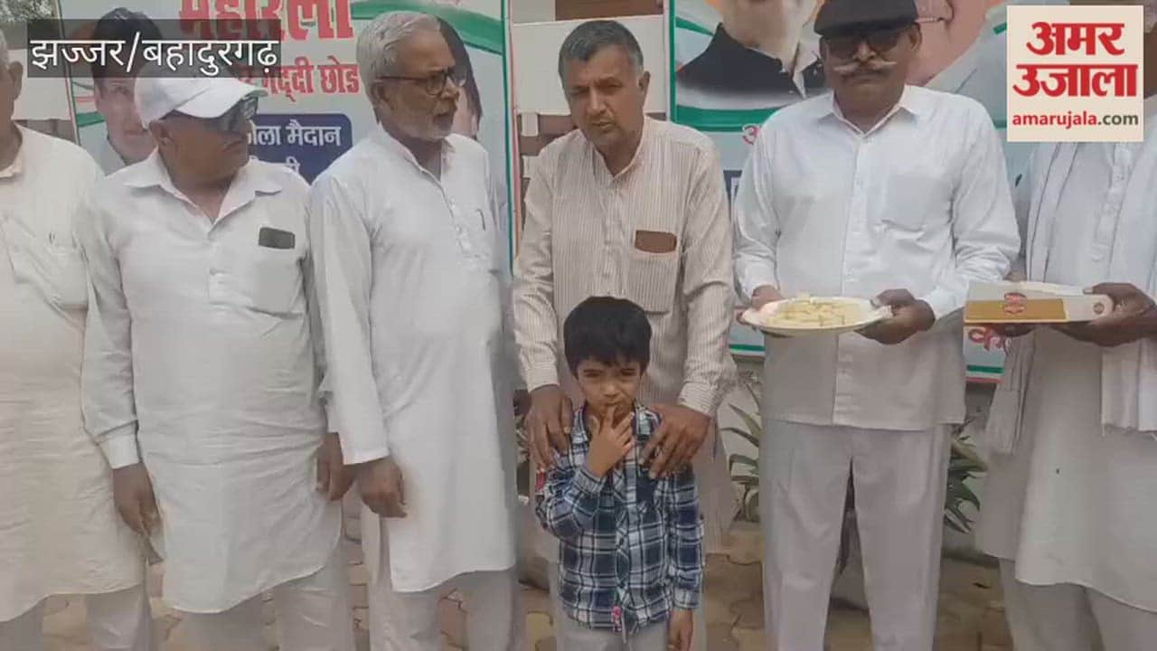 Sweets were distributed to celebrate the appointment of Karambir Bauddh as a Rajya Sabha MP