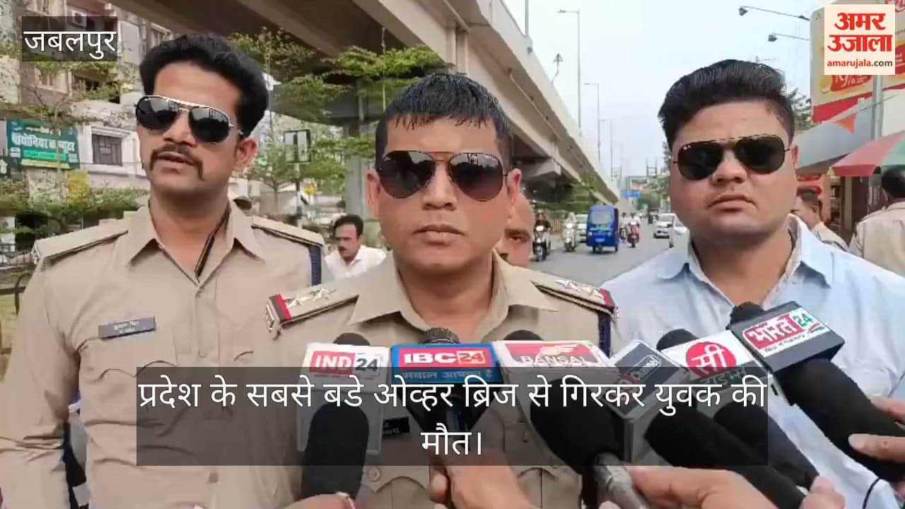 A young man died after falling from the state's largest overbridge