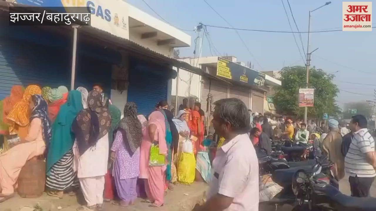 Gas Cylinder Slips Distributed Under Police Guard in Jhajjar
