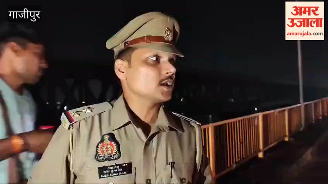 Tractor-trolley crashes through railing and plunges into Ganges while swerving to avoid biker