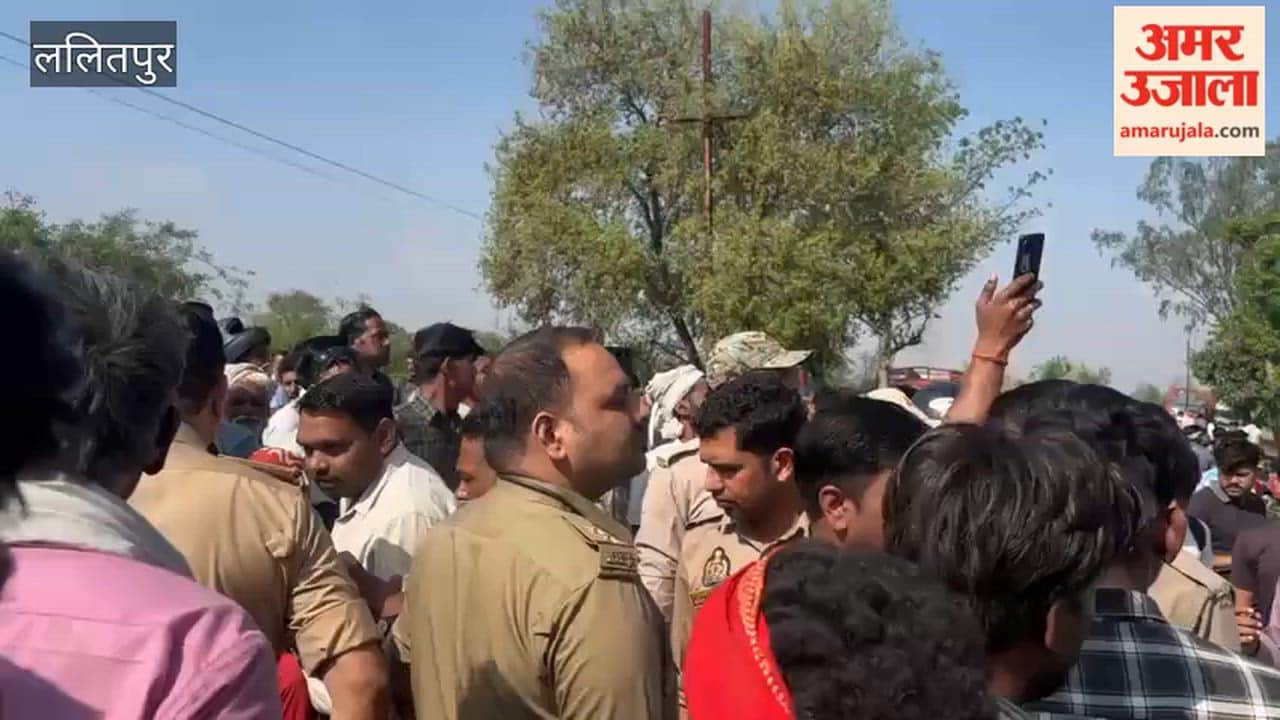 Farmers in Lalitpur sit on the road demanding immediate compensation for crops destroyed by rain.