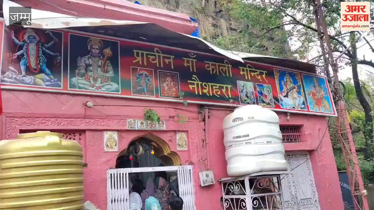 Nowshera's historic Kali Mata temple illuminated during Navratri, crowds of devotees gathered