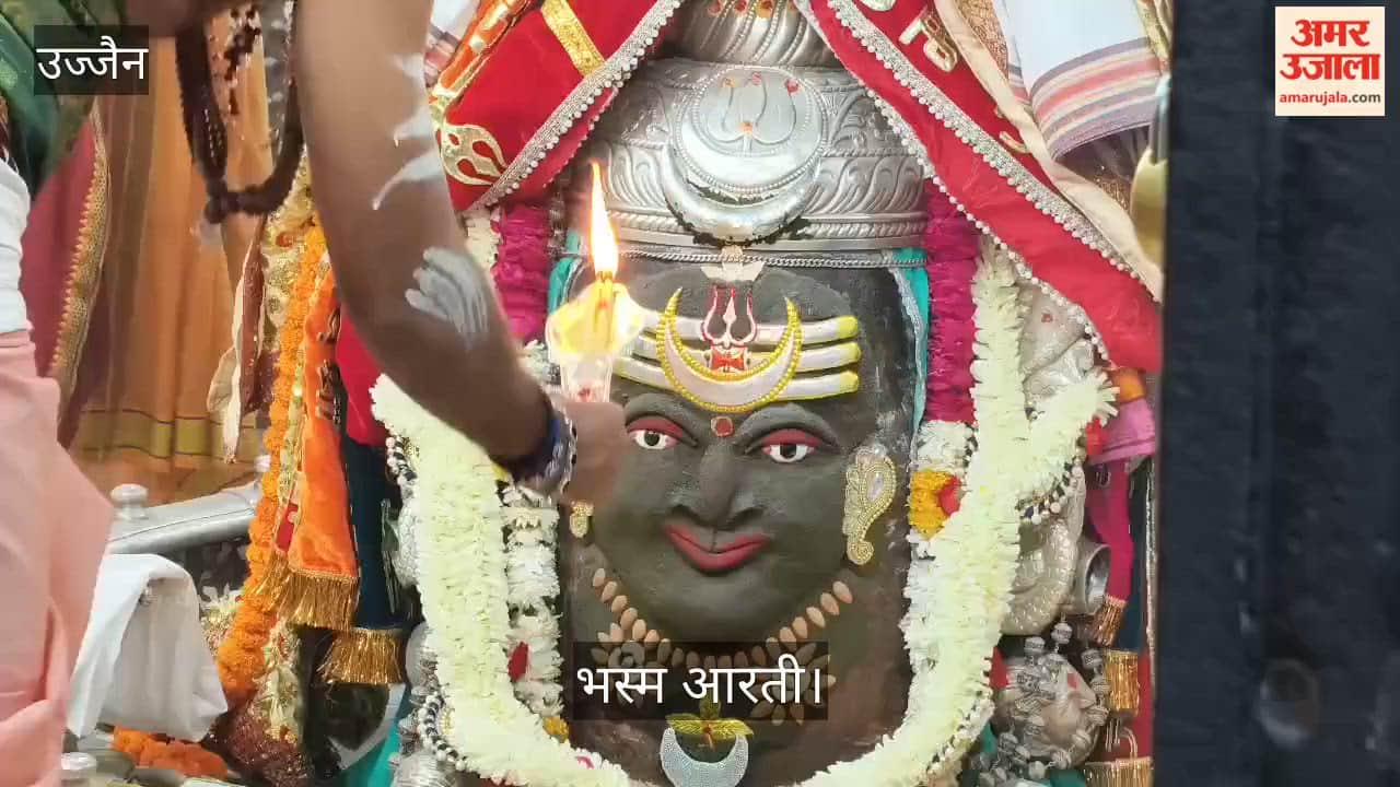 Baba Mahakal adorned cannabis, moon, tripund, trident, damru and covered with ashes.