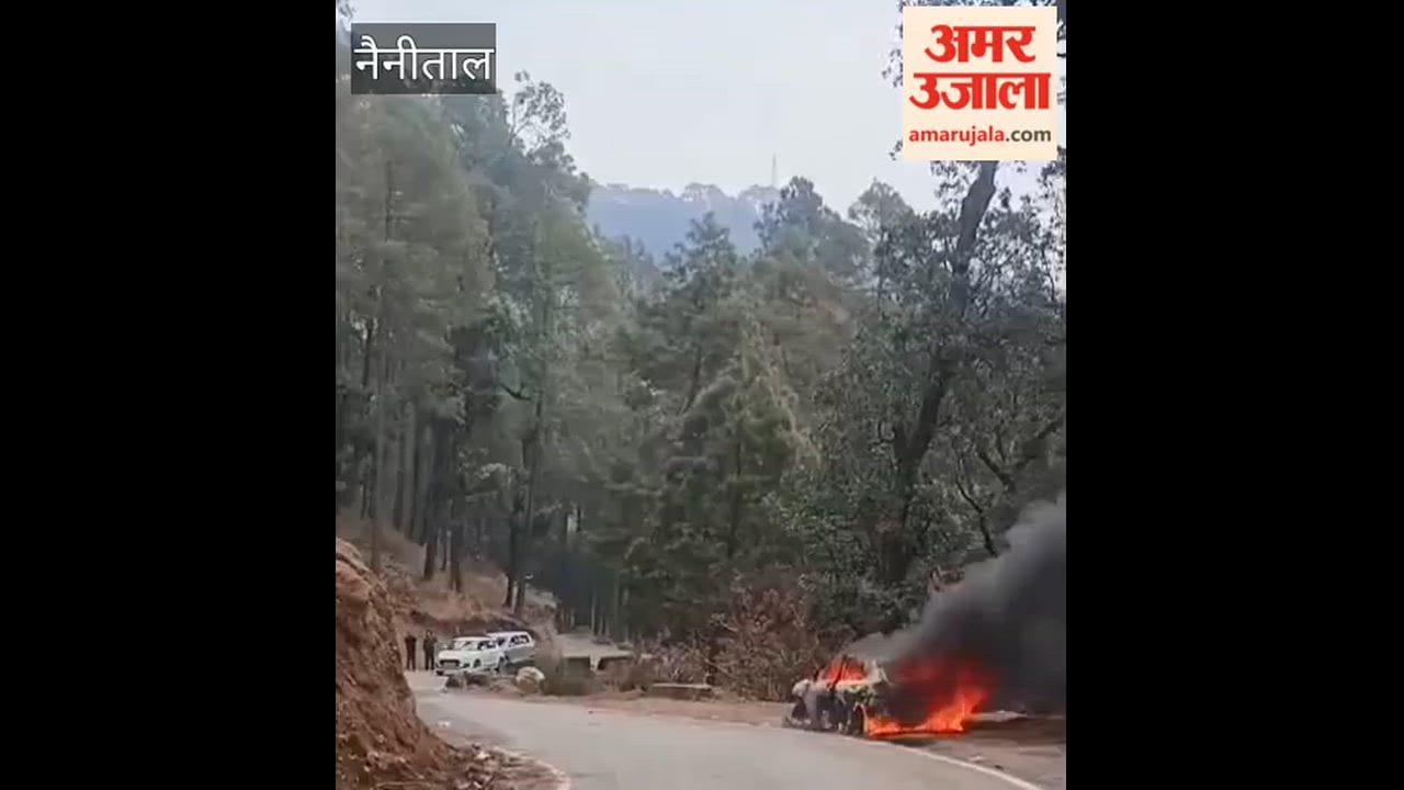 car parked on the roadside in Kainchi Dham caught fire