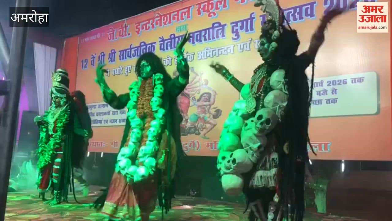 Devotees swayed to the rhythm of devotional hymns to the Goddess at the Navdurga Chamunda Temple