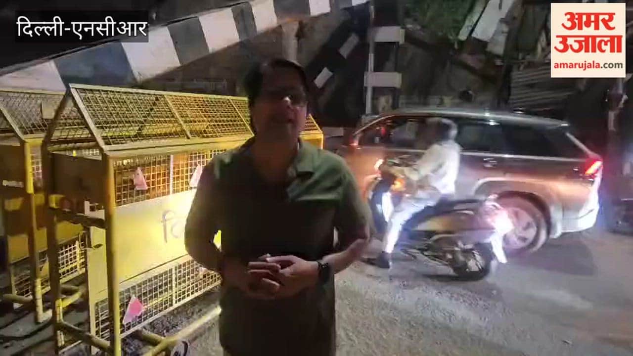 section of old lohe ke pul broke off and hung over road