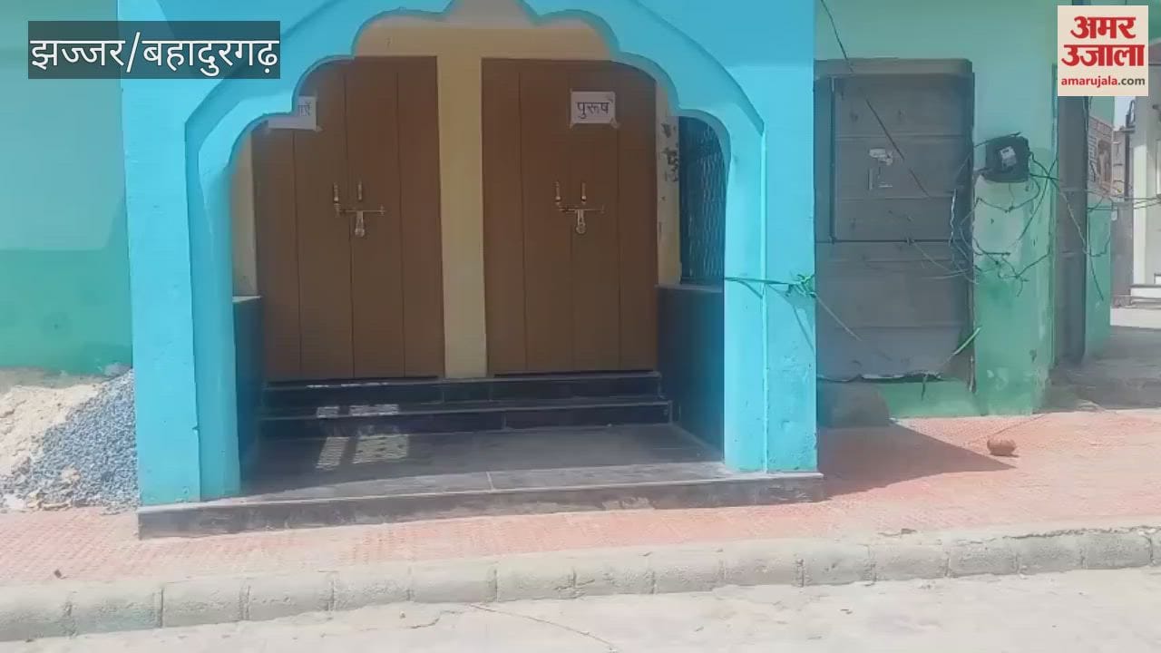 Locks hanging on toilets in Jhajjar