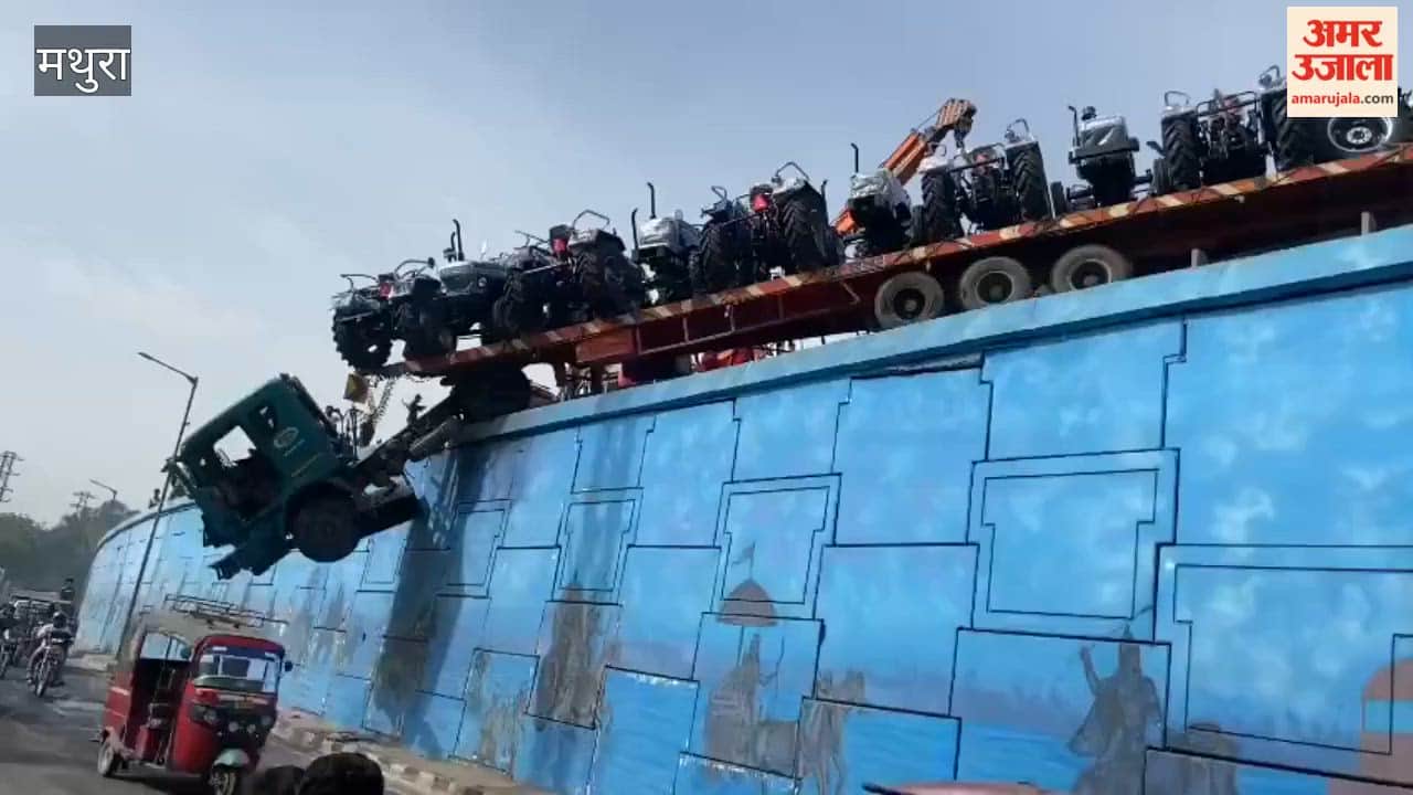 Trolley Loaded with Tractors Left Dangling from Highway Bridge in Mathura
