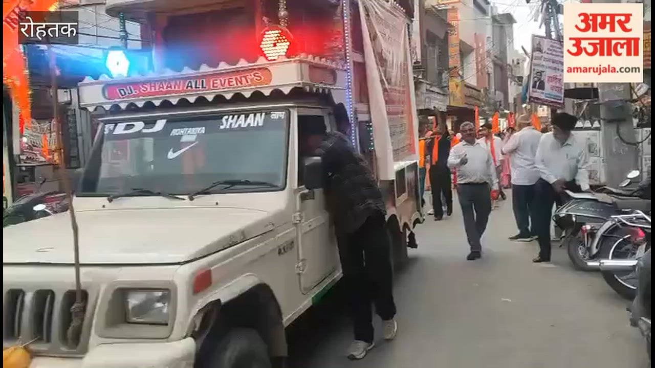 The city of Rohtak was immersed in devotion following a grand saffron vehicle procession.
