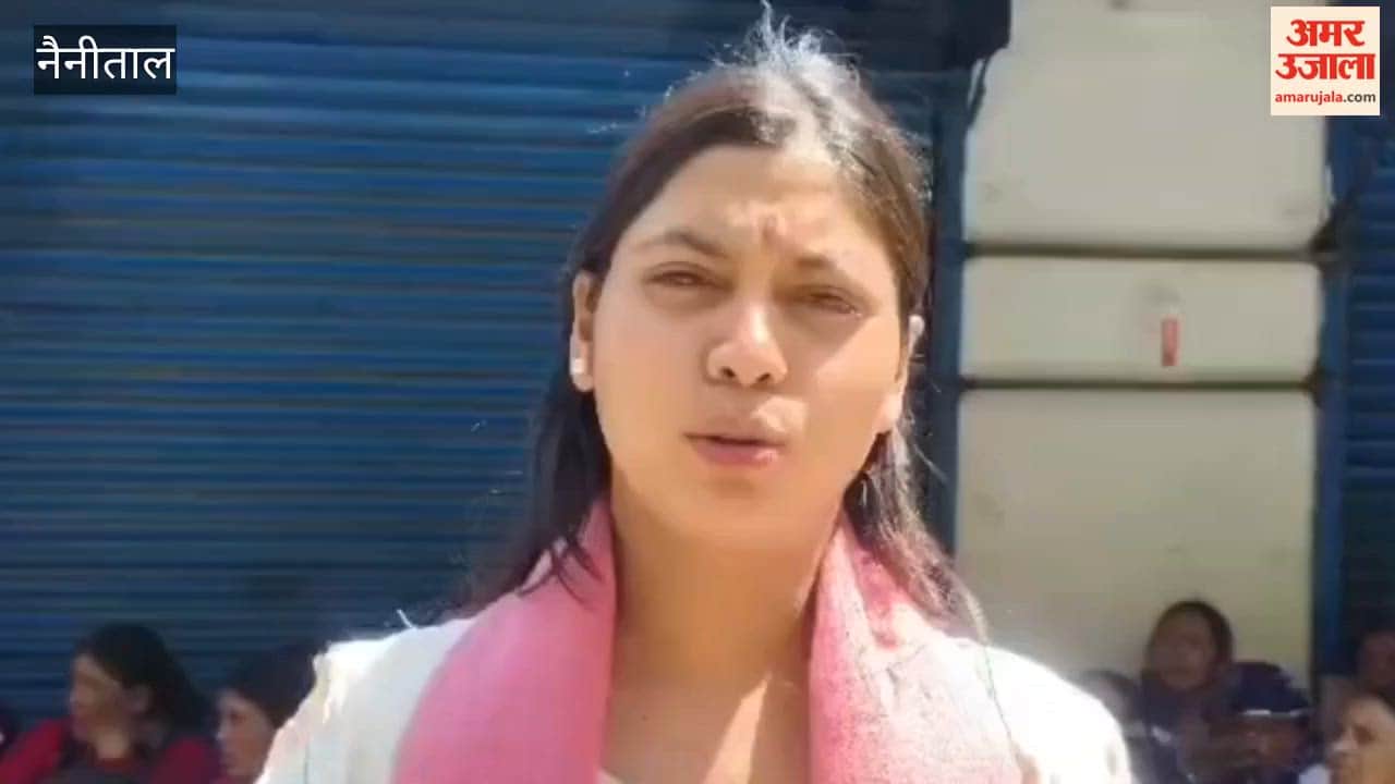 Villagers take to the streets in Nainital's Mangoli to protest against a liquor shop