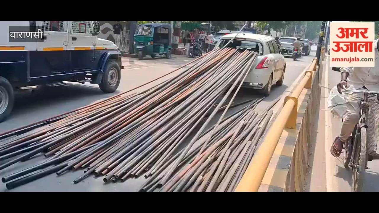 Iron pipe pierces car, bank employee survives