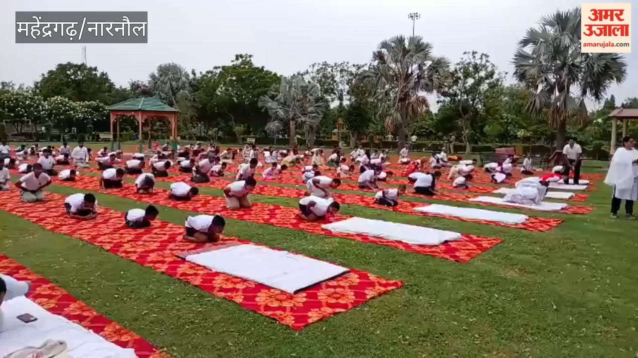 Officials and practitioners performed yoga exercises at a camp in Mahendragarh.