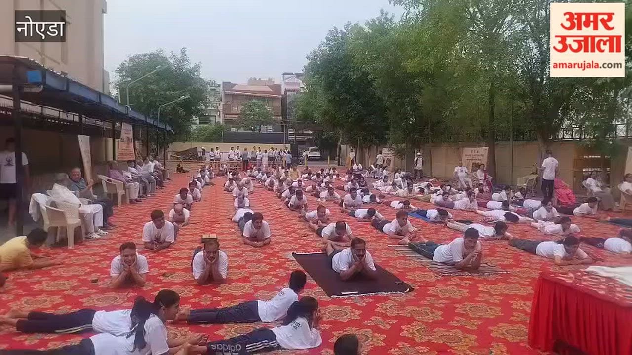 People practiced yoga in Noida Sector 55 on International Yoga Day