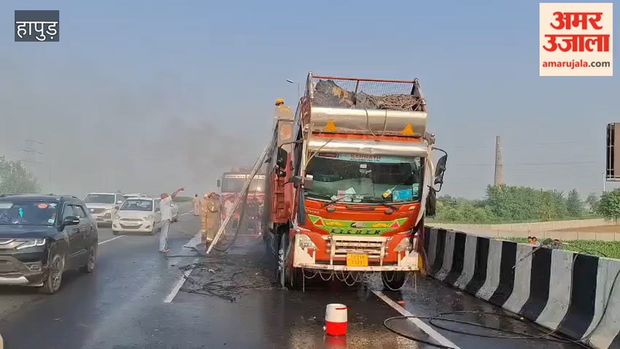 Massive fire breaks out in moving Canter truck driver and cleaner jump to safety