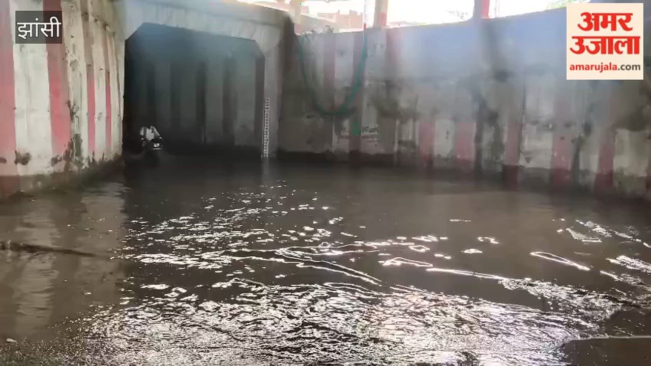 Water accumulated in the railway underpass after just light rain, causing trouble for commuters; the water could not be drained even after 12 hours.