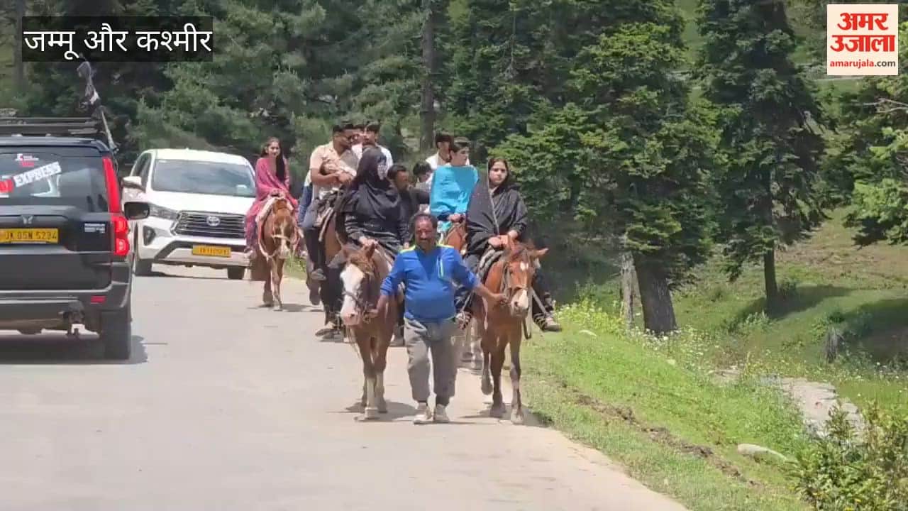 Tourists visiting the world-famous hill resort of Gulmarg on Sunday