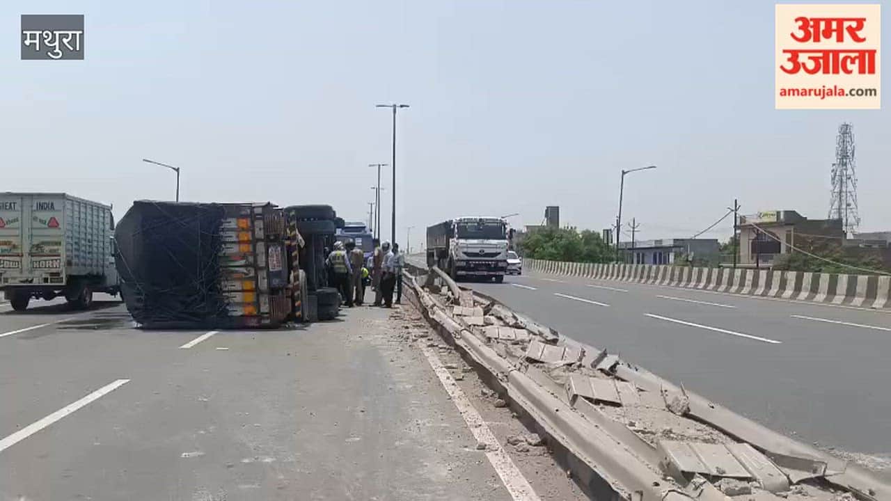Overloaded Cotton Truck Overturns on Flyover After Hitting Divider, Driver Critically Injured