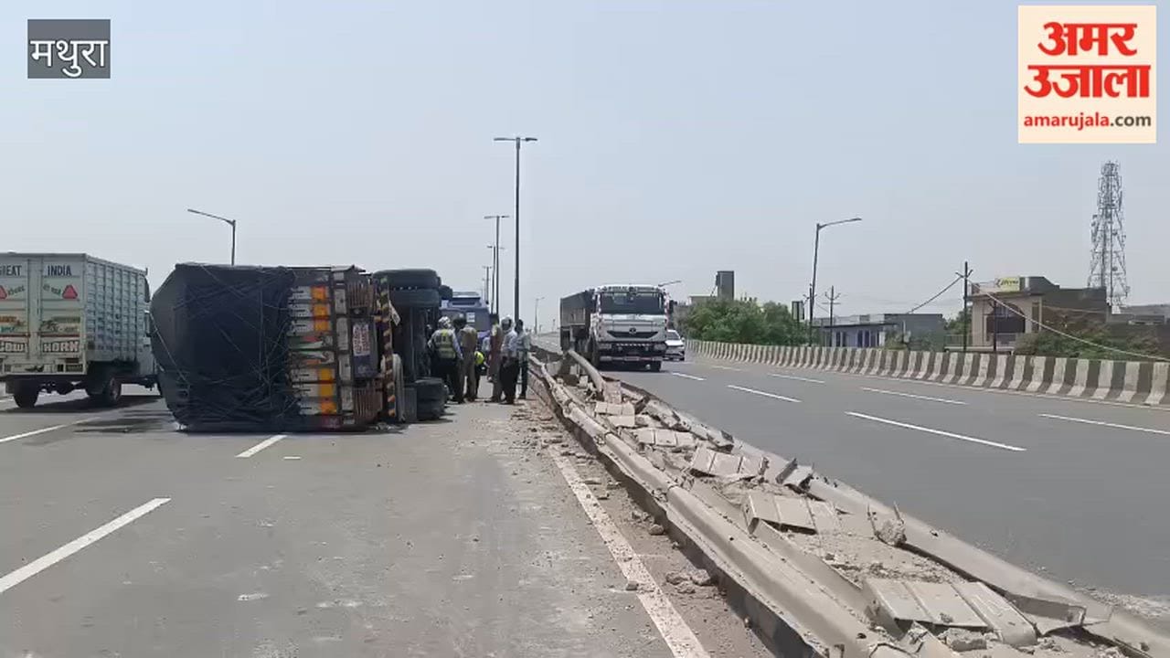 Overloaded Cotton Truck Overturns on Flyover After Hitting Divider, Driver Critically Injured