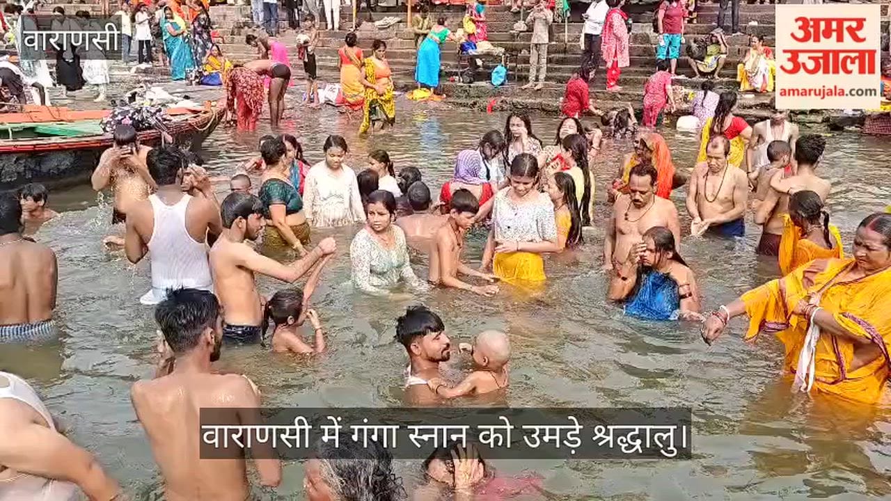Devotees throng Dashashwamedh Ghat for a holy dip in the Ganges on Jyeshtha Purnima