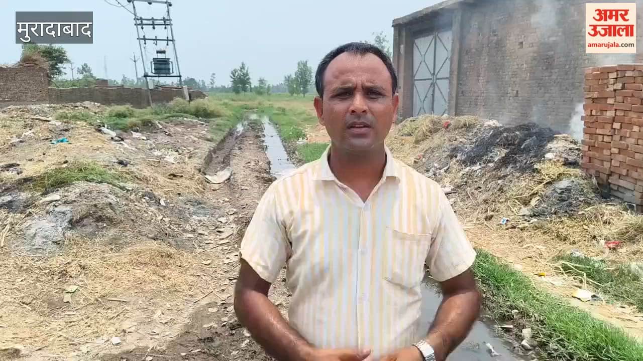 Waterlogging on the village's main road has made it difficult for people to pass