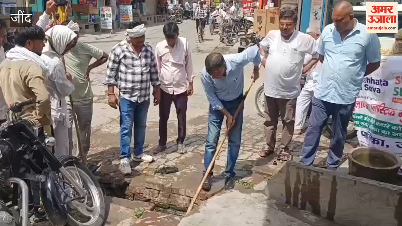 Julana SDM arrives to inspect drainage system ahead of monsoon; picks up a shovel himself