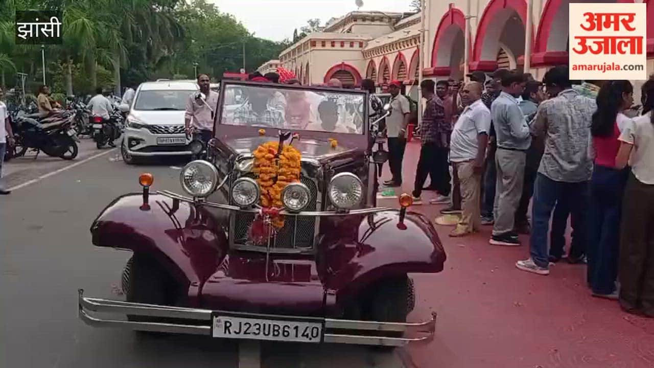 Retired railway employee given a grand send-off in a vintage car.