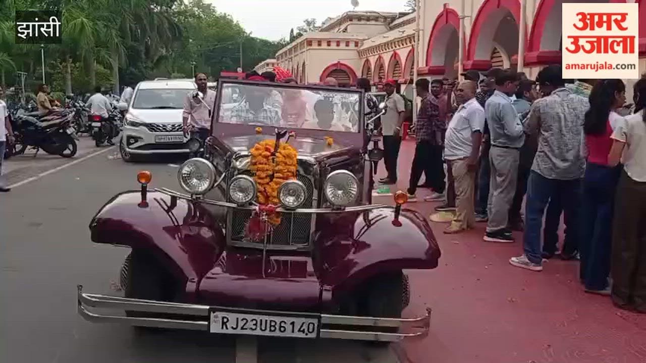 Retired railway employee given a grand send-off in a vintage car.