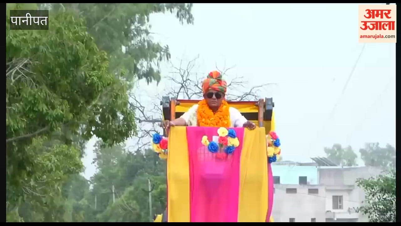 Upon retirement, he left his car behind and arrived at the village riding a 100-foot-high Hydra crane.
