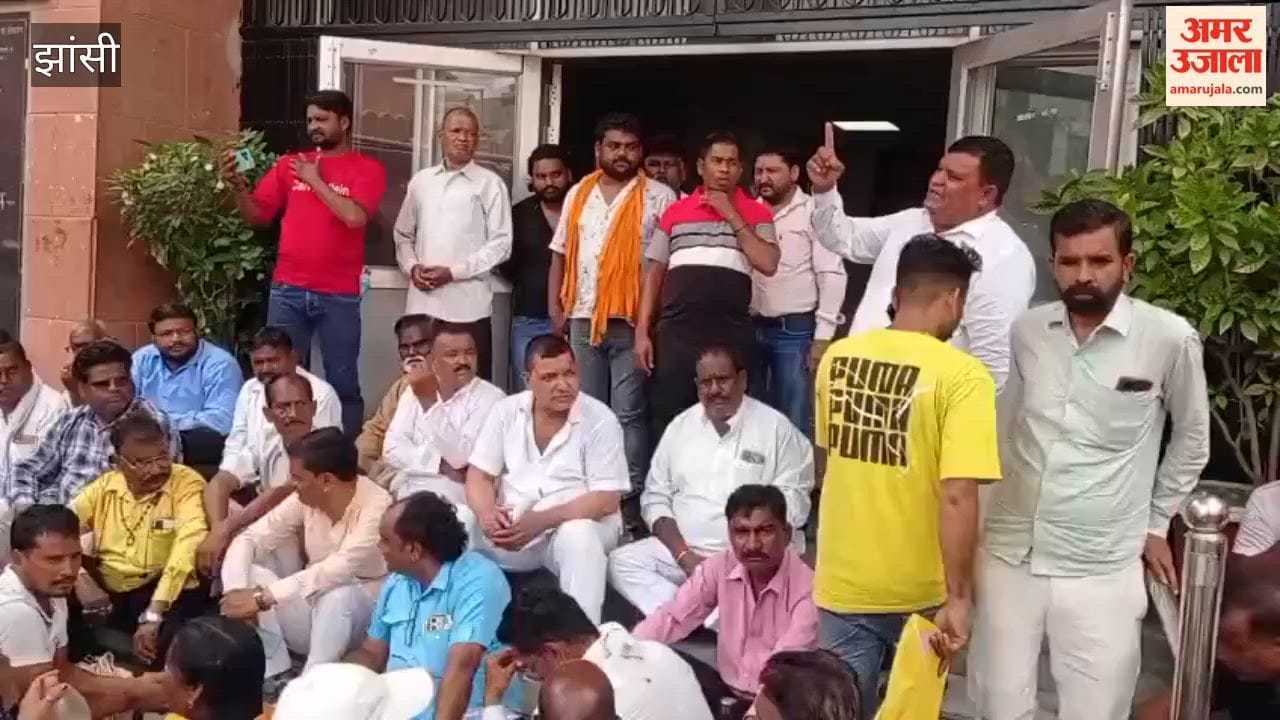Sanitation workers staged a protest at the Municipal Corporation over their demands.
