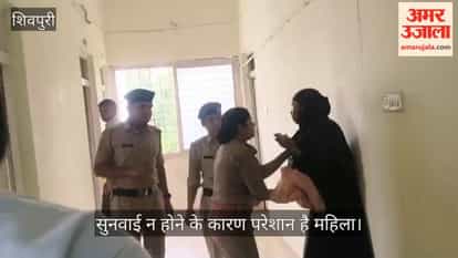 Woman attempts suicide by dousing herself with petrol at SP's public grievance hearing.
