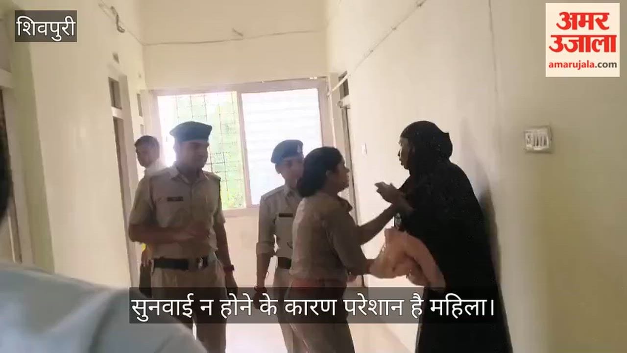 Woman attempts suicide by dousing herself with petrol at SP's public grievance hearing.