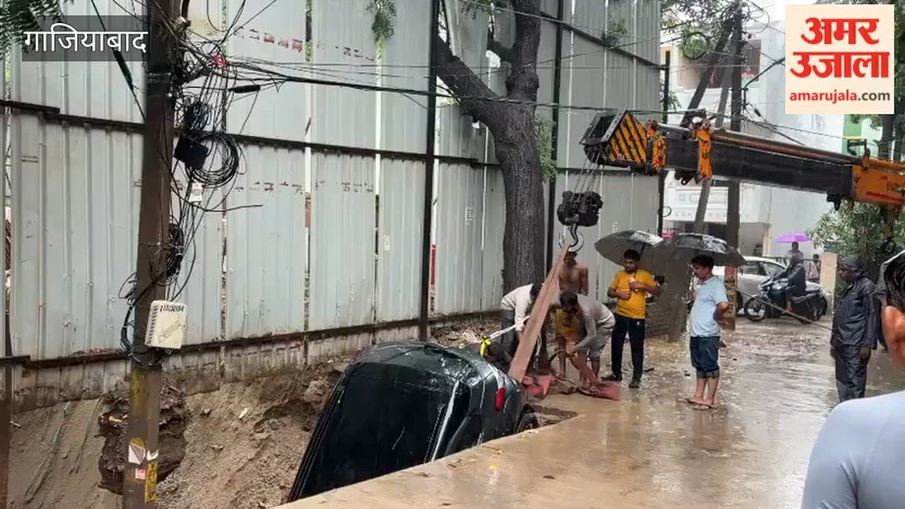 Road caves in near under-construction building in Vasundhara car and scooter fall 20 feet down