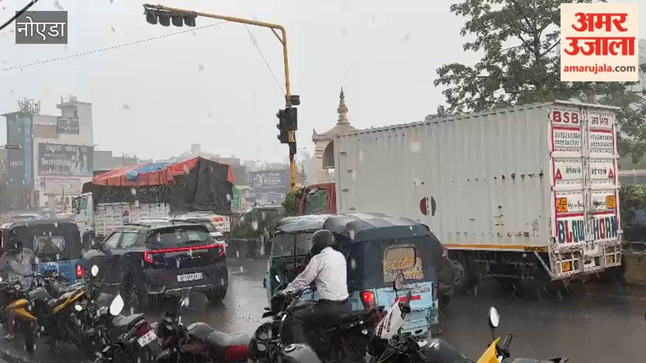 Heavy rain in Greater Noida and slows down traffic on roads