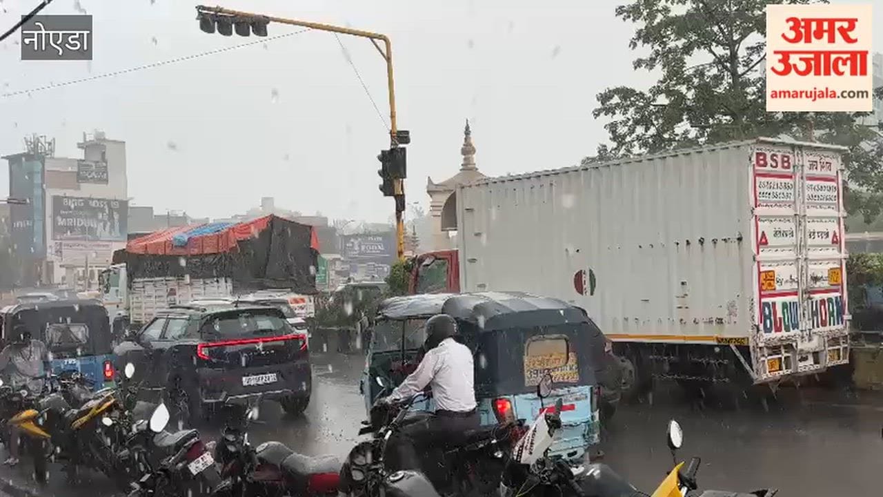 Heavy rain in Greater Noida and slows down traffic on roads