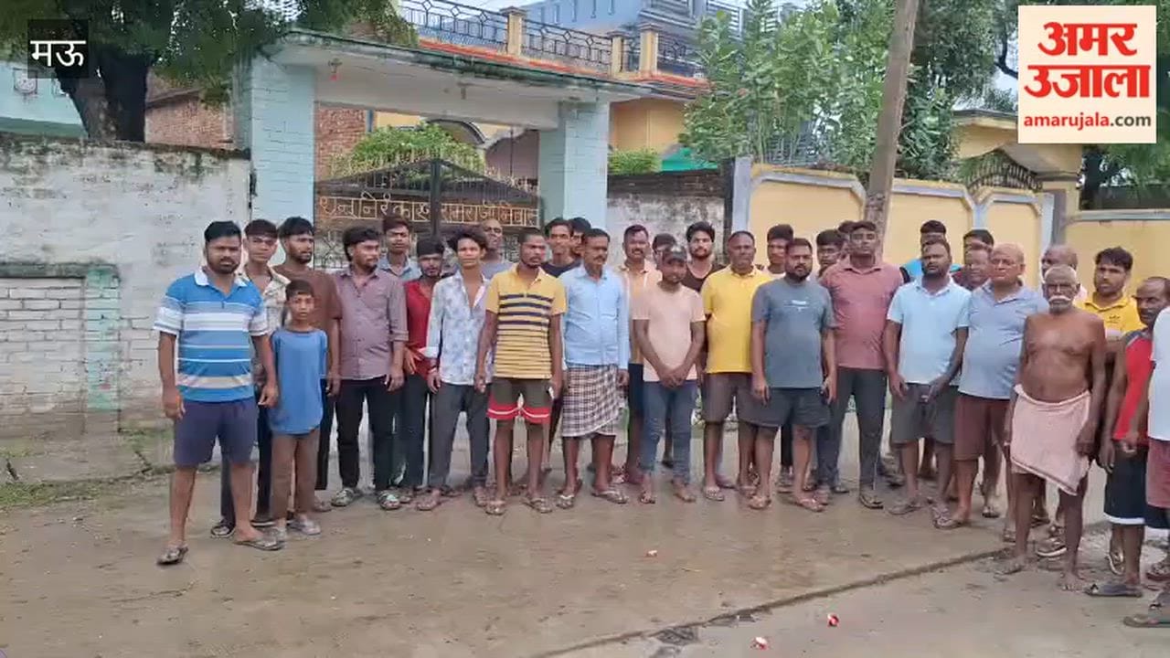 Agitated villagers protest demanding construction of roads and drains