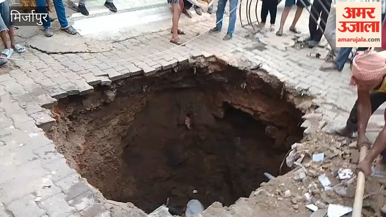 Road suddenly caves in in Mirzapur rider and scooter plunge into pit