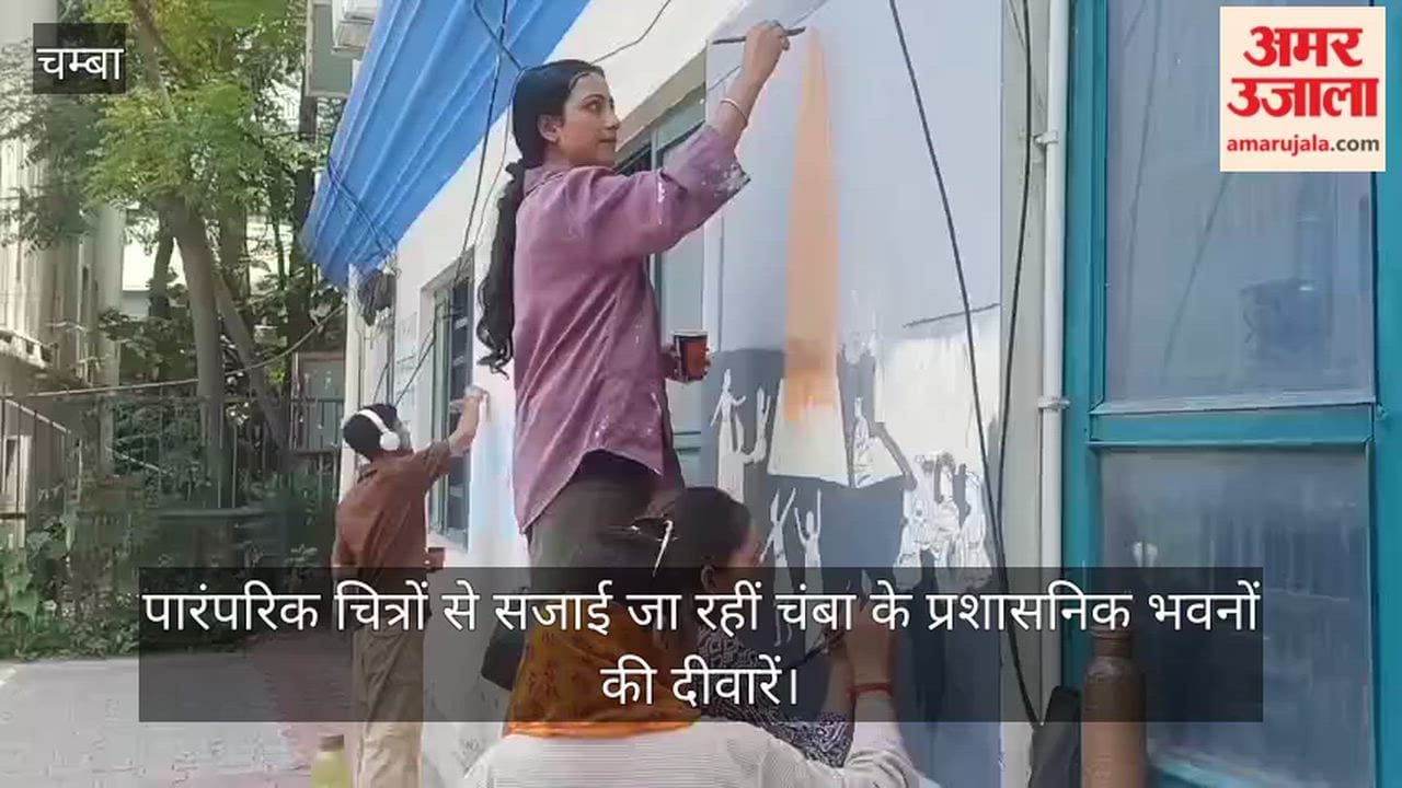 Walls of administrative buildings in Chamba being decorated with traditional paintings.
