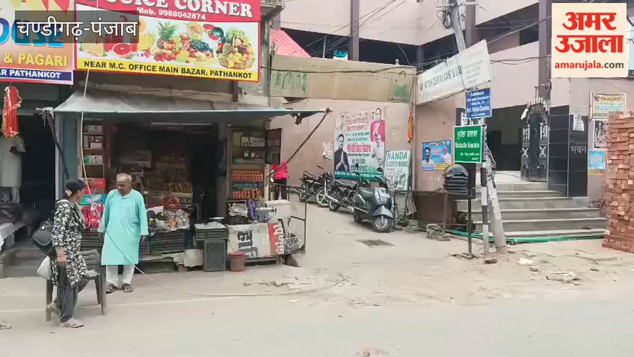 Power line snaps and falls onto the road near Ram Bhavan in Pathankot.