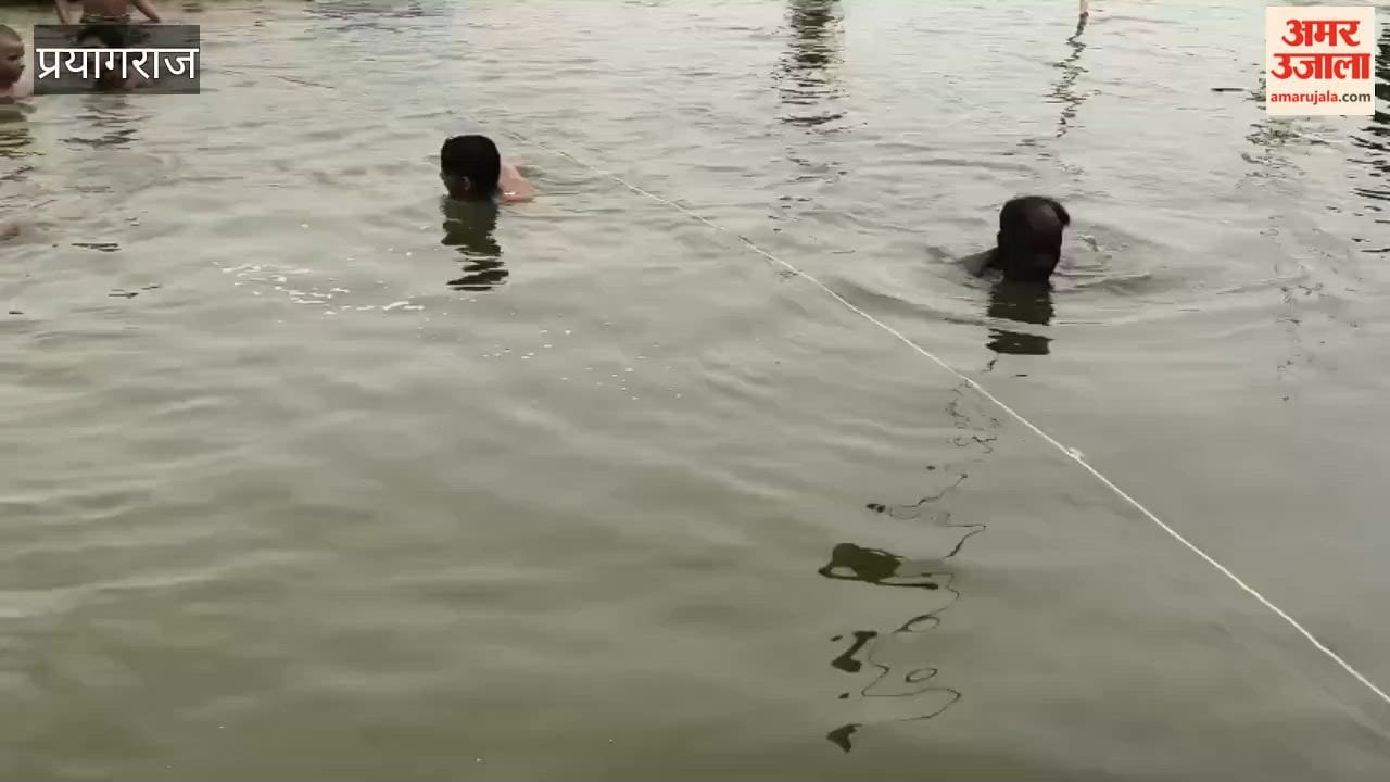 Divers deployed amidst rising river water levels.