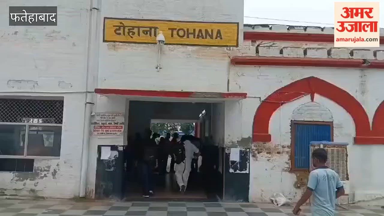 Police conduct flag march at Tohana railway station; security stepped up in view of the farmers' protest.