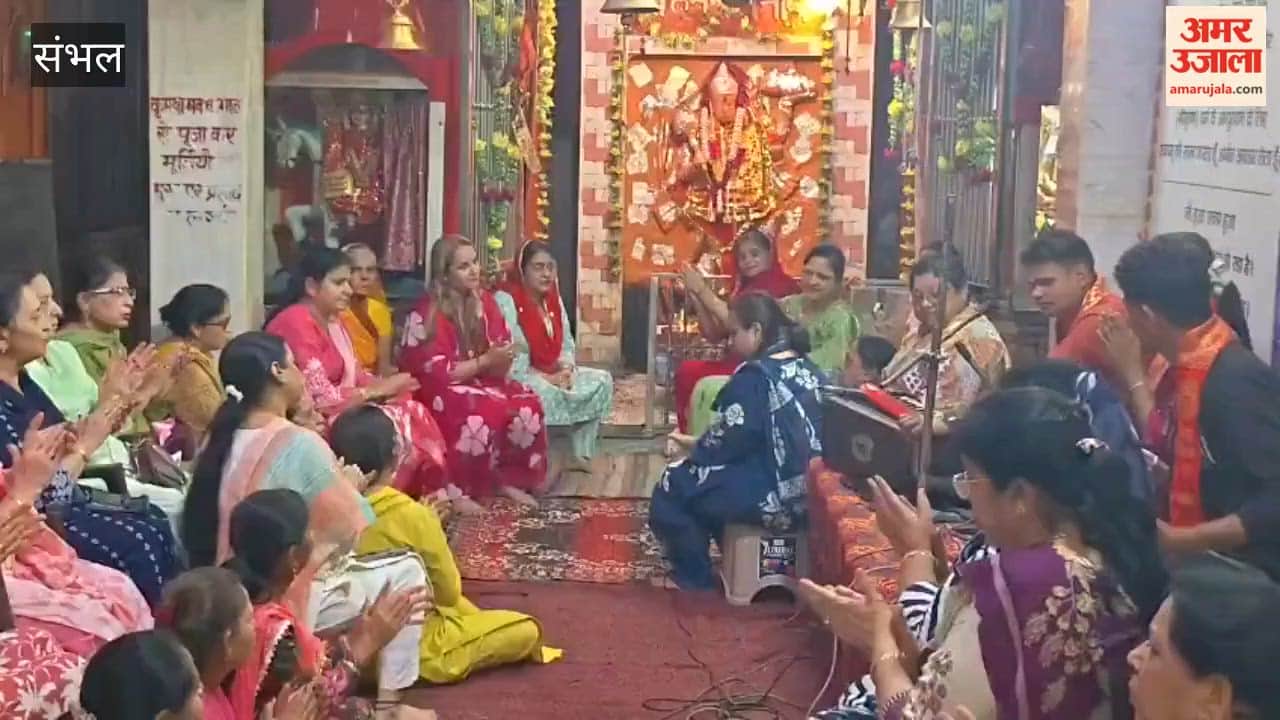 Devotees sway to the bhajan Pyara Saja Hai Tera Dwar Bhavani