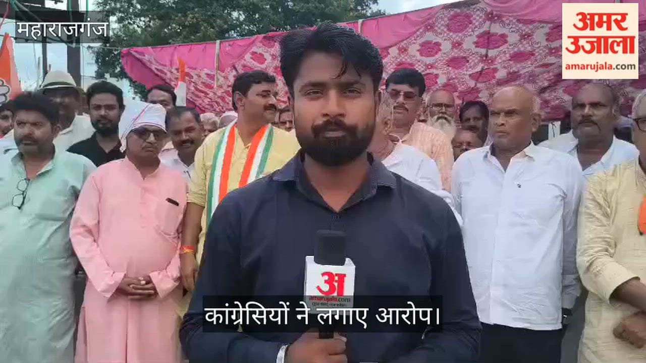 Congress members stage a sit-in protest against Rahul Gandhi's arrest.