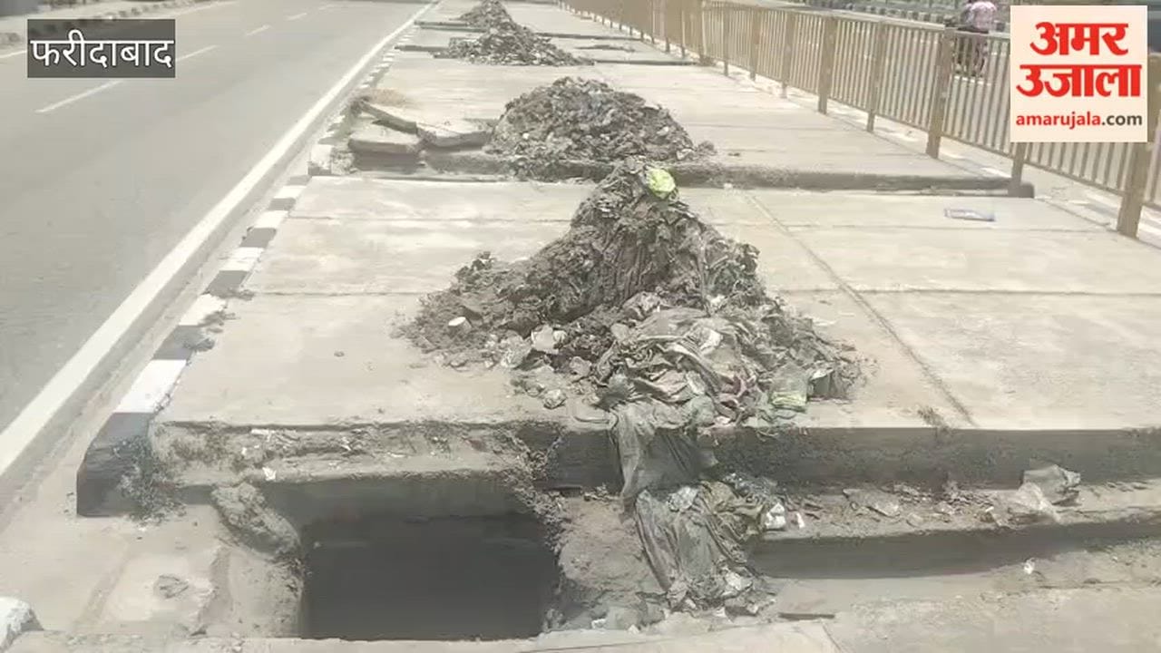 Open manholes and piles of garbage in Old Faridabad