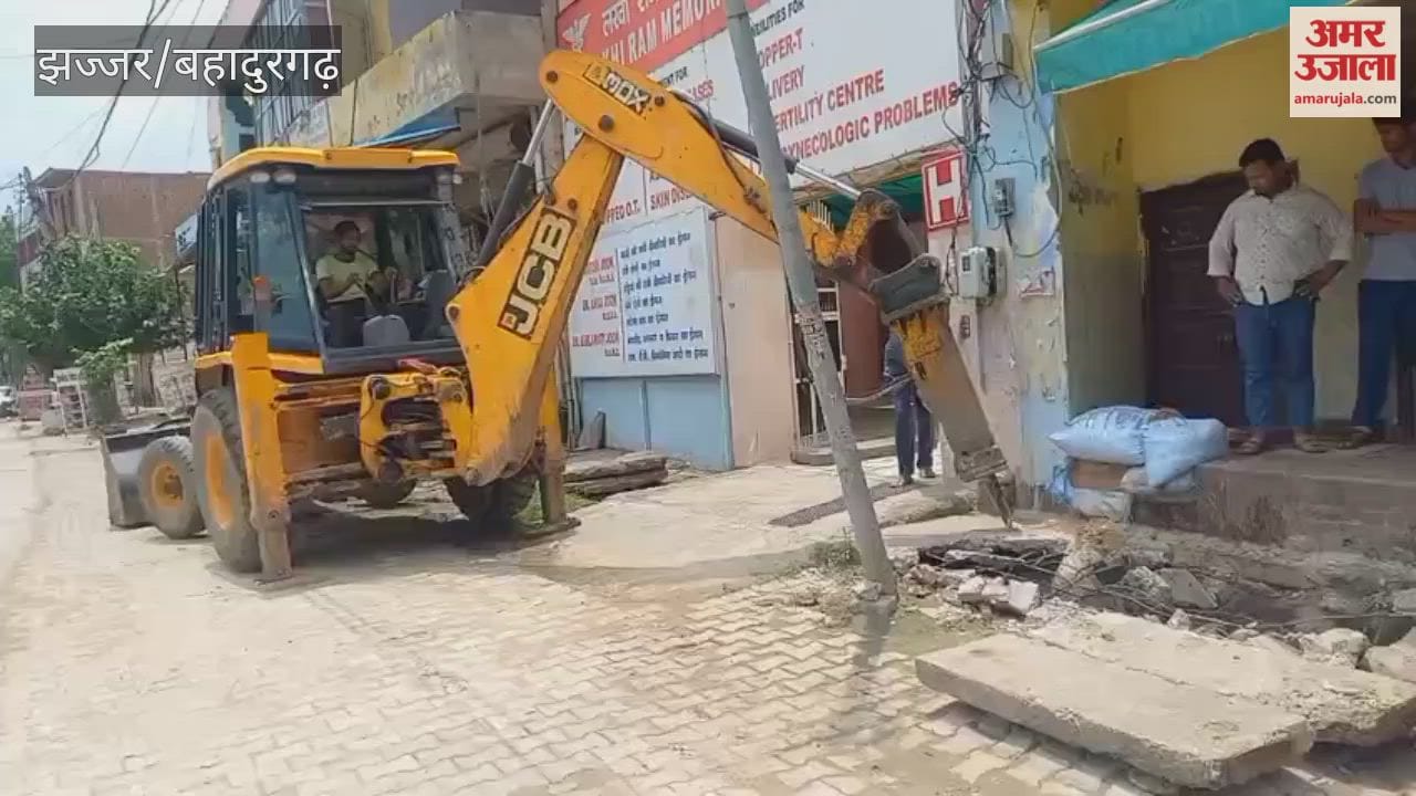 Municipal Council demolished permanent structure built over a drain on Old Barfkhana Road in Jhajjar