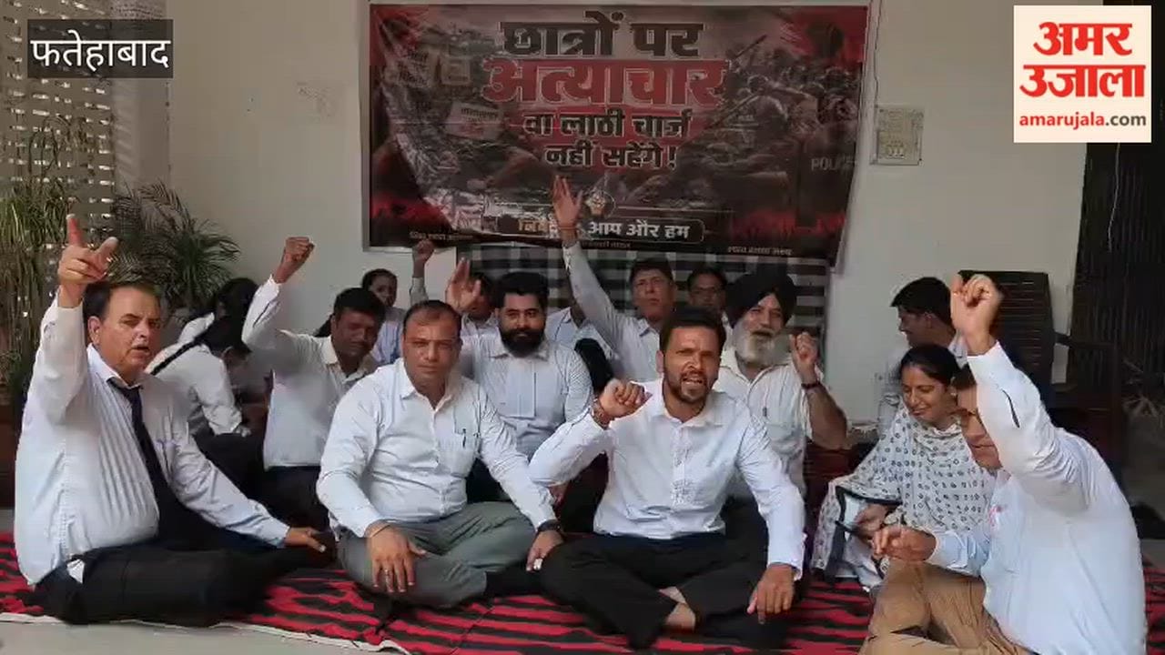Lawyers stage a sit-in protest in Fatehabad against the lathi-charge on students in Delhi.