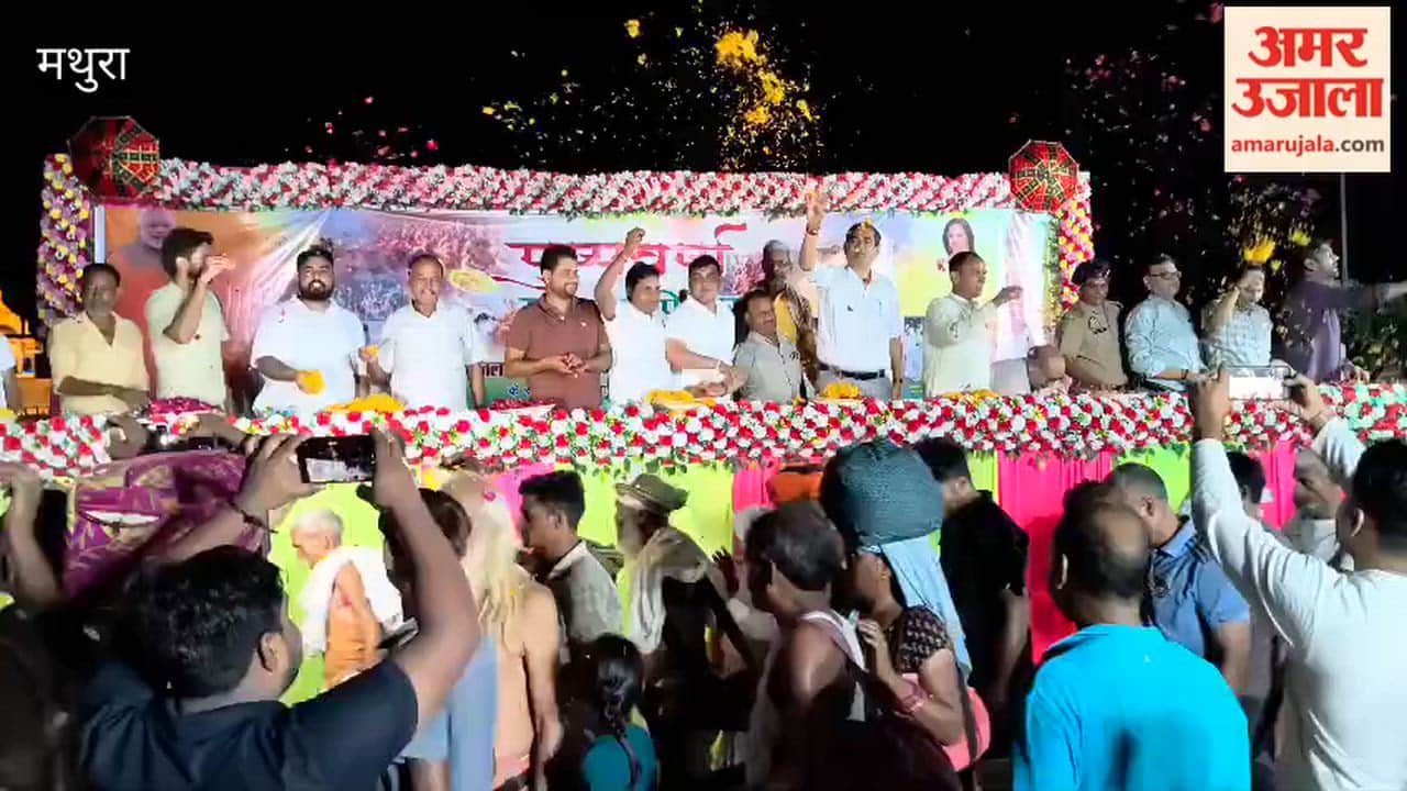 Devotees Showered with Flowers at Govardhan Mudiya Purnima Fair